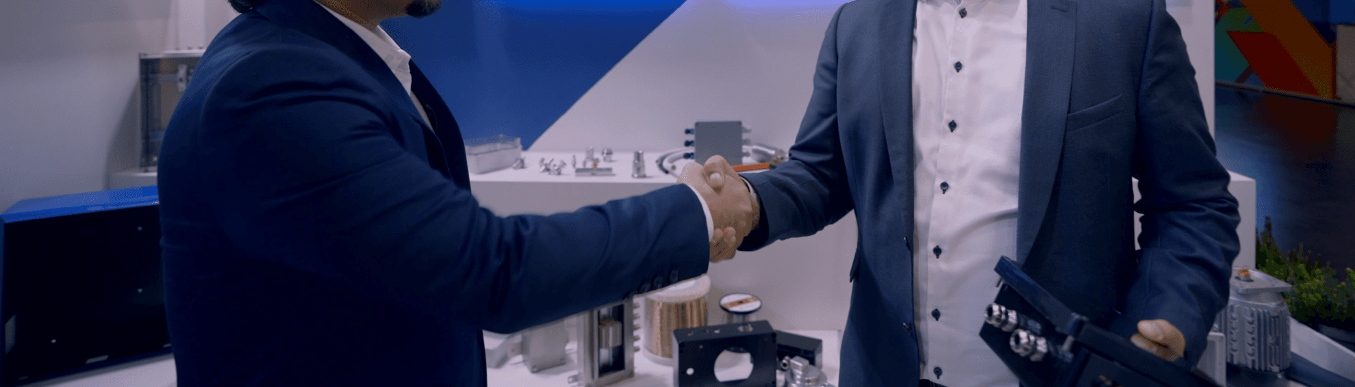 XINDUX representatives at an industrial trade fair